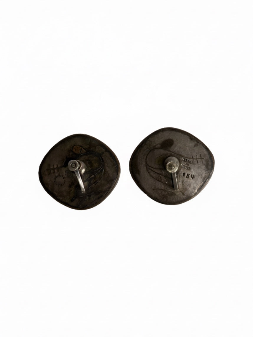 Vintage Los Castillos Taxco silver earrings with intricate Castillo design, crafted by Embajada Vintage from 1950s silverware.