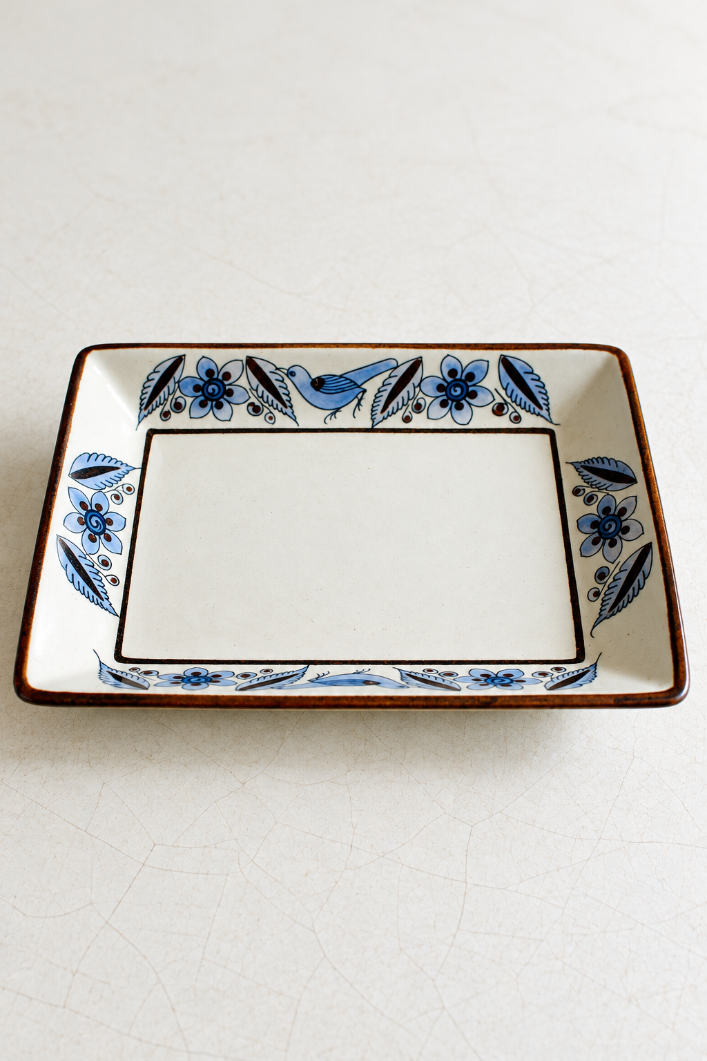 Folk floral ceramic serving dish by Embajada Craft, rectangular El Palomar Tonalá tableware tray with colorful decorative patterns.