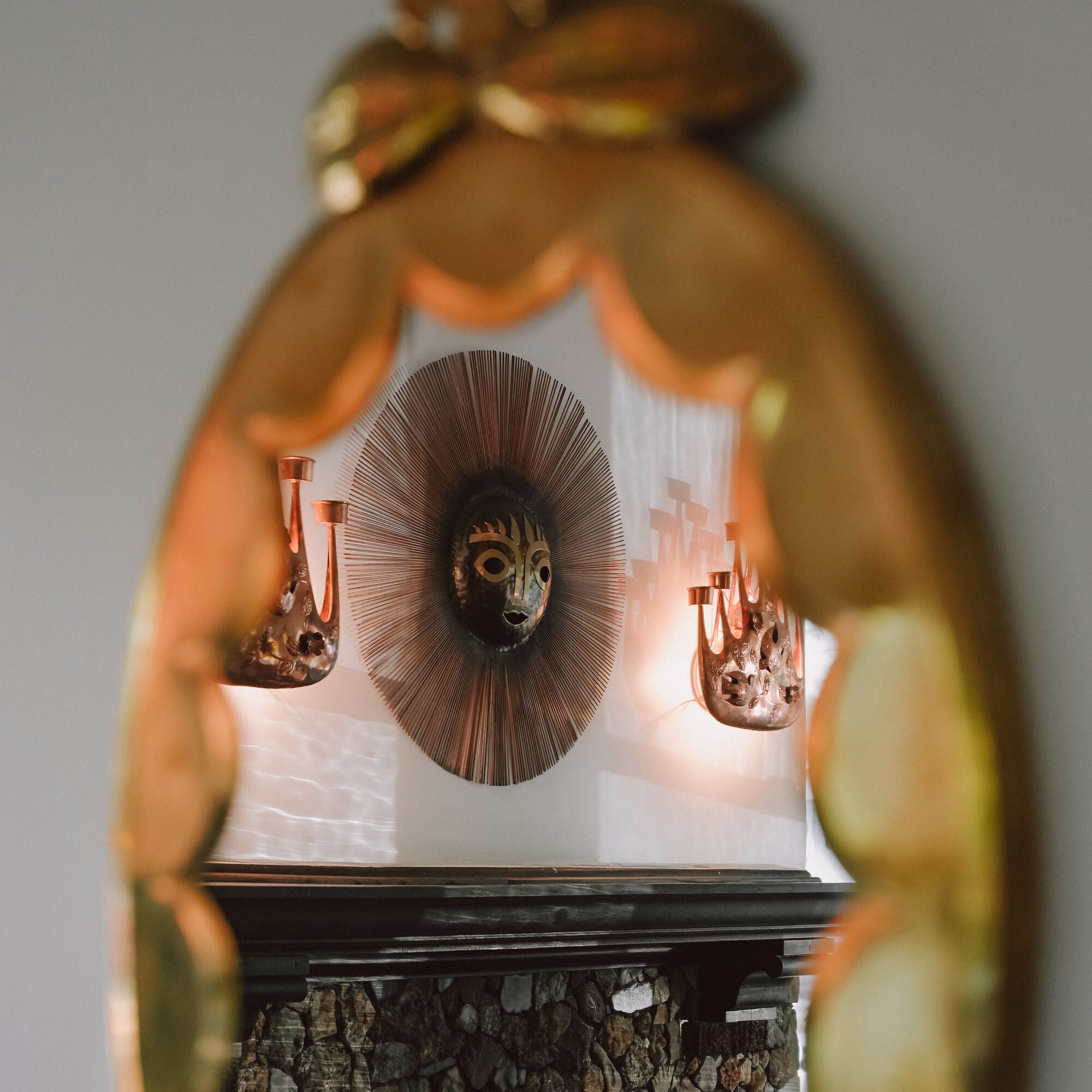 Gene Byron Brass Mirror used as home decor, featuring a sleek brass frame and reflective glass surface.