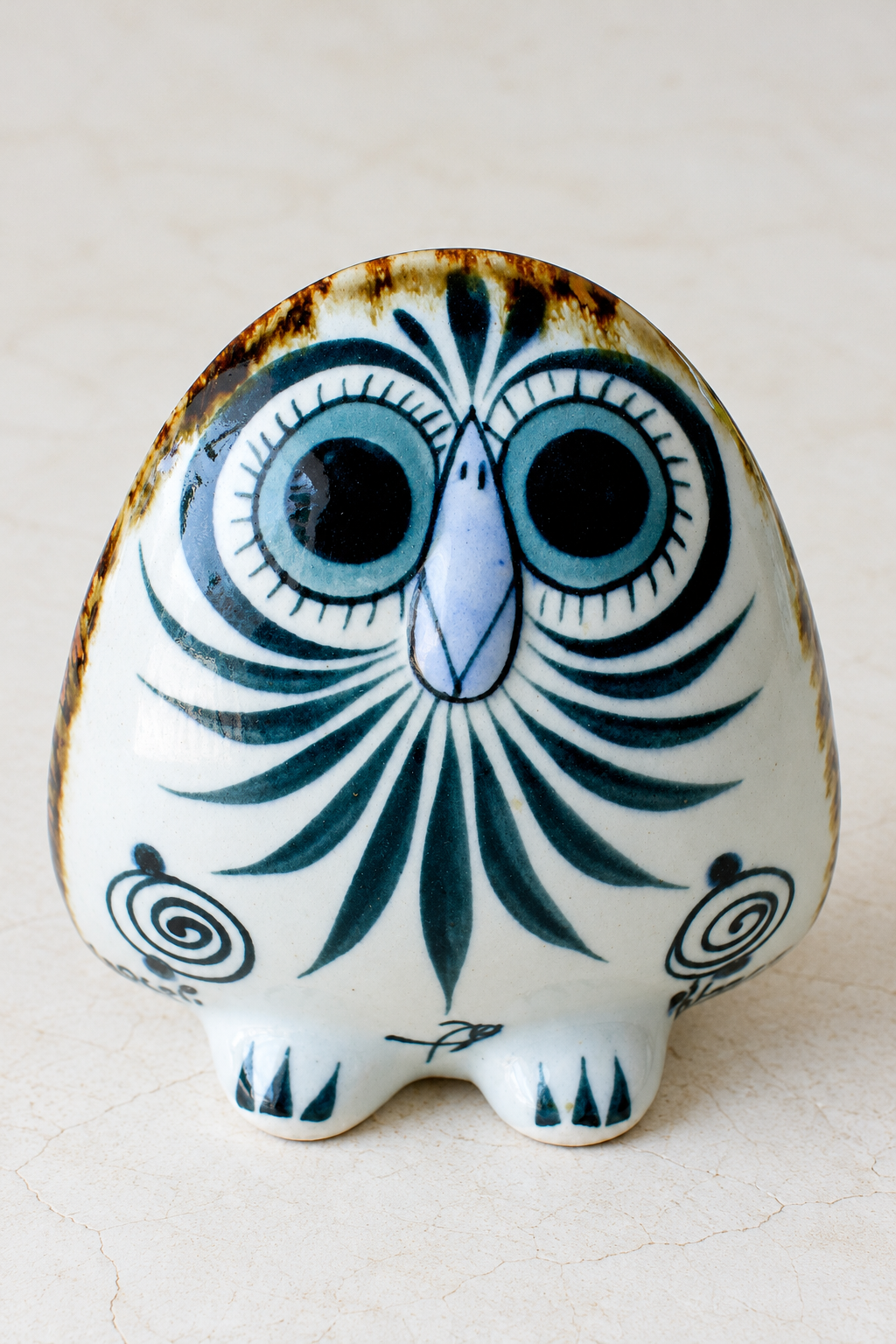 Hand-painted teal-eyed ceramic owl, El Palomar Flat-Faced Owl home decor by Embajada Craft, showcasing detailed craftsmanship.