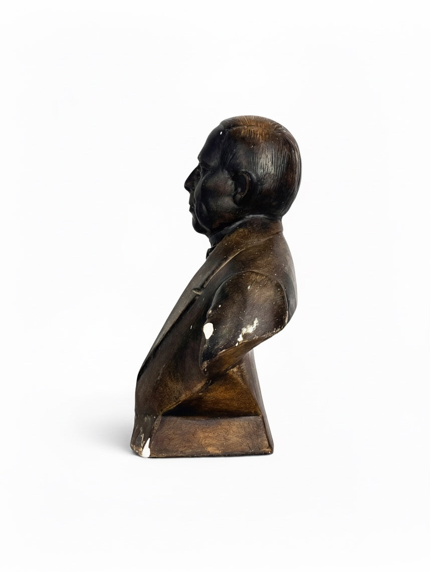 Vintage plaster bust of Benito Juarez from Oaxaca, a classic home decor piece with historical significance.