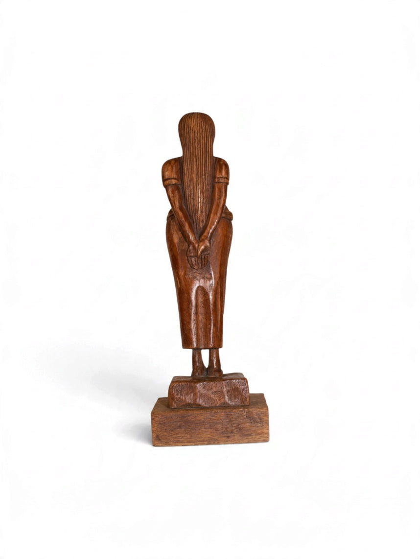 Carved wooden mother sculpture by Embajada Vintage, detailed home decor artwork showcasing intricate craftsmanship.