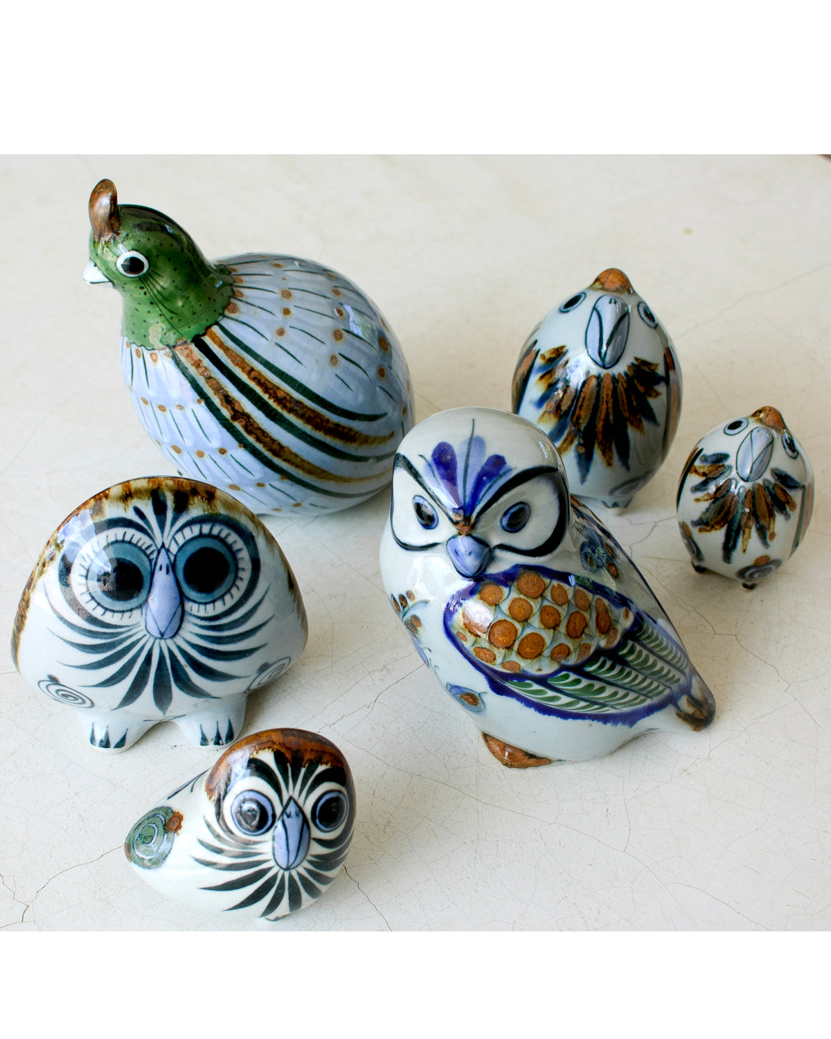 Three-legged owl sculpture from El Palomar by Embajada Craft, a unique home decor piece with intricate details.