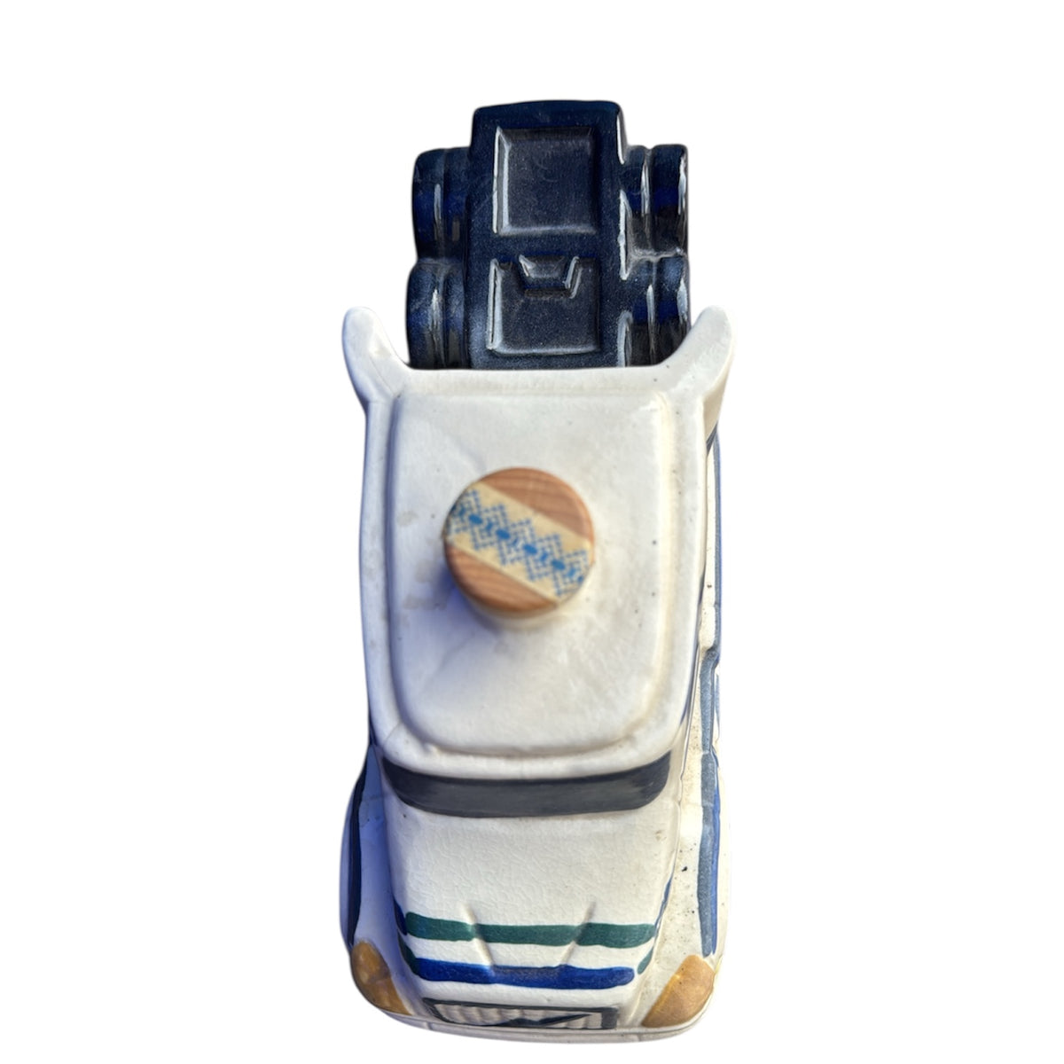 Vintage ceramic truck-shaped tequila bottle from Embajada Vintage, used as unique home decor or collectible piece.