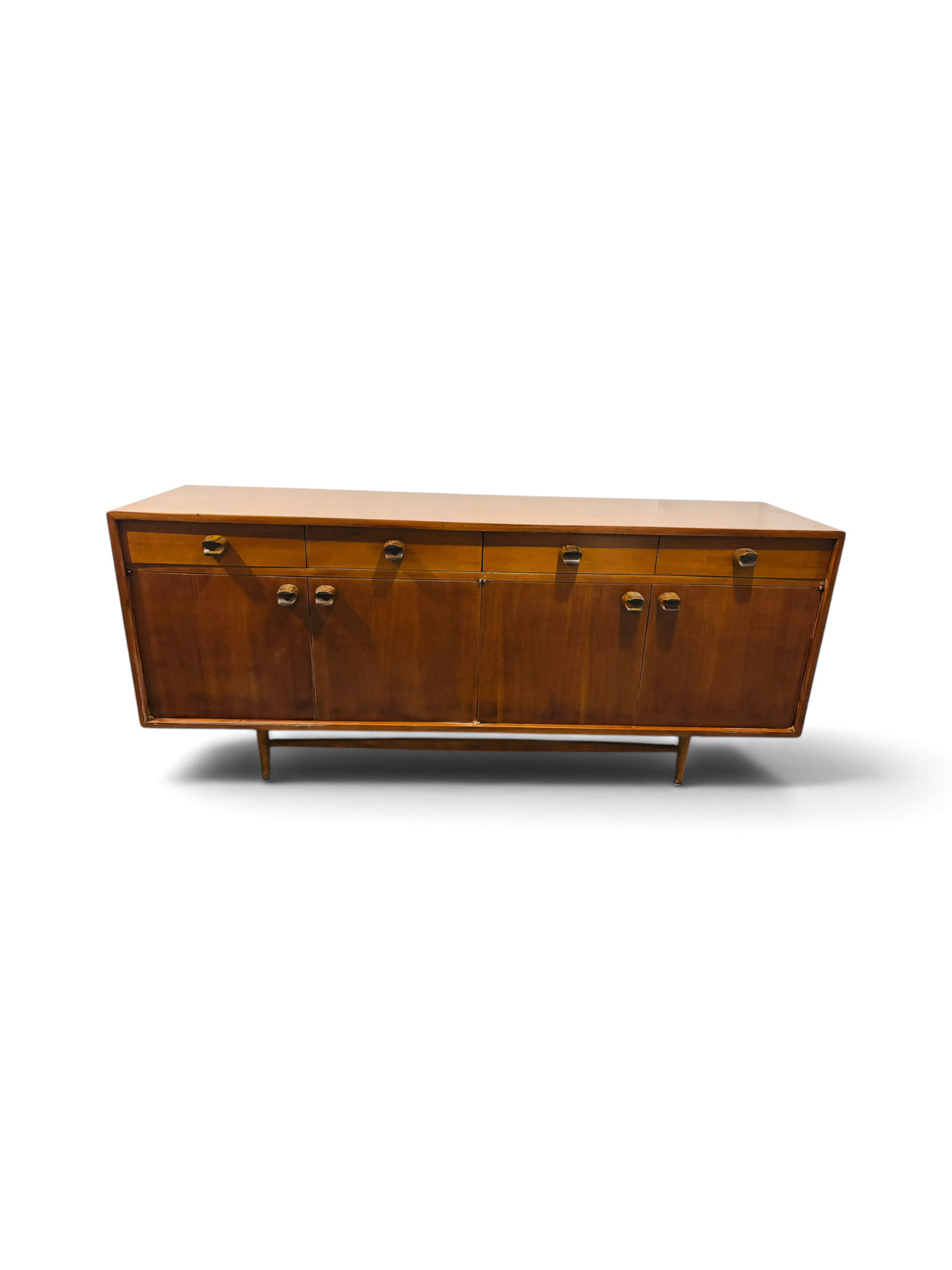 Long Mexican Mid-Century Wood Credenza by Embajada Vintage, showcasing sleek wooden furniture with mid-century design elements.