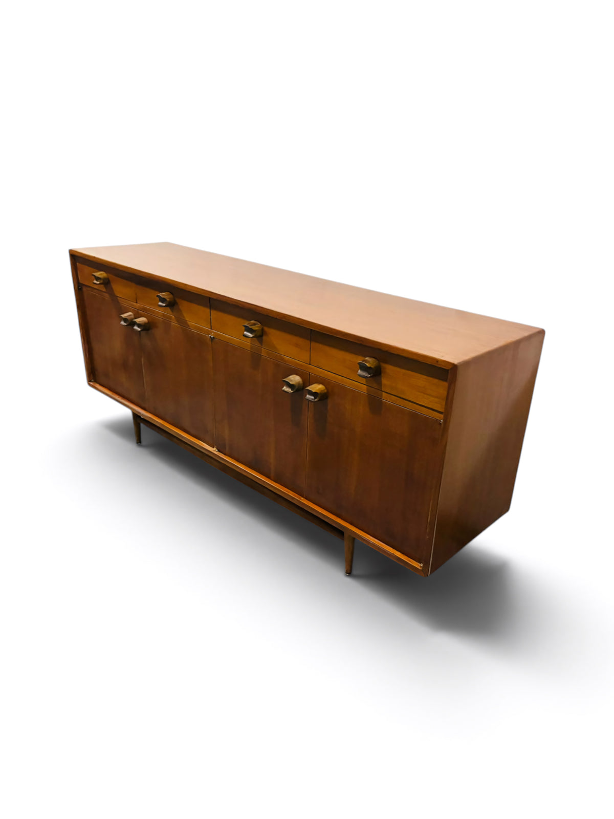 Mid-century wooden Mexican credenza with sleek design and natural finish, crafted by Embajada Vintage, ideal for stylish storage.