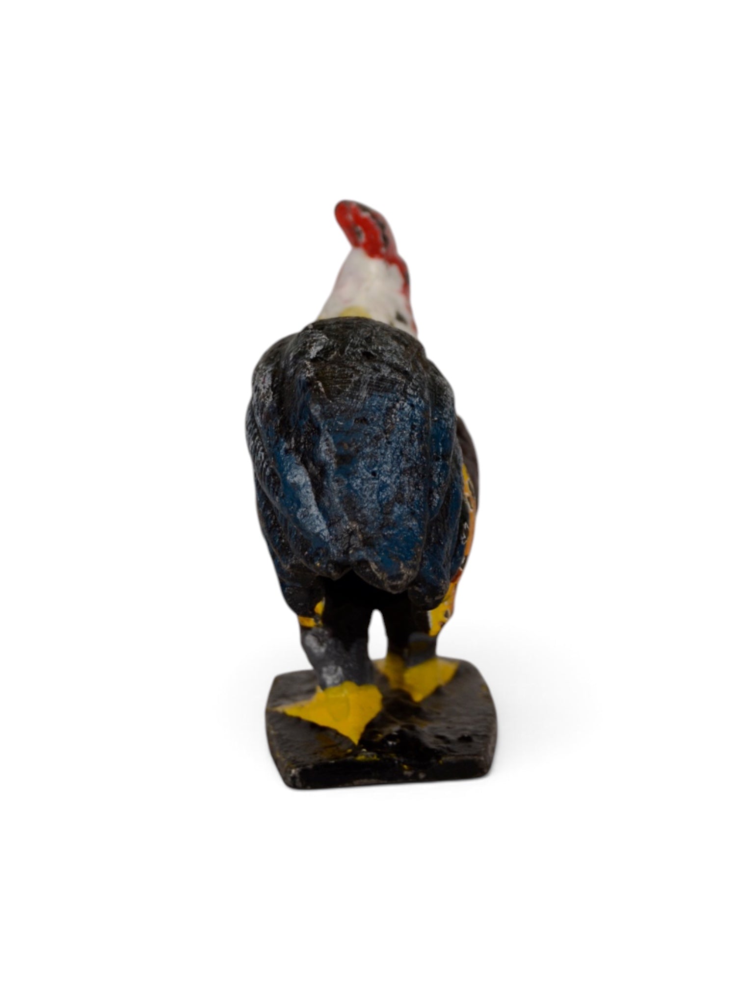 Colorful polychrome iron rooster home decor piece by Embajada Vintage, featuring vibrant painted details and a detailed standing figure.