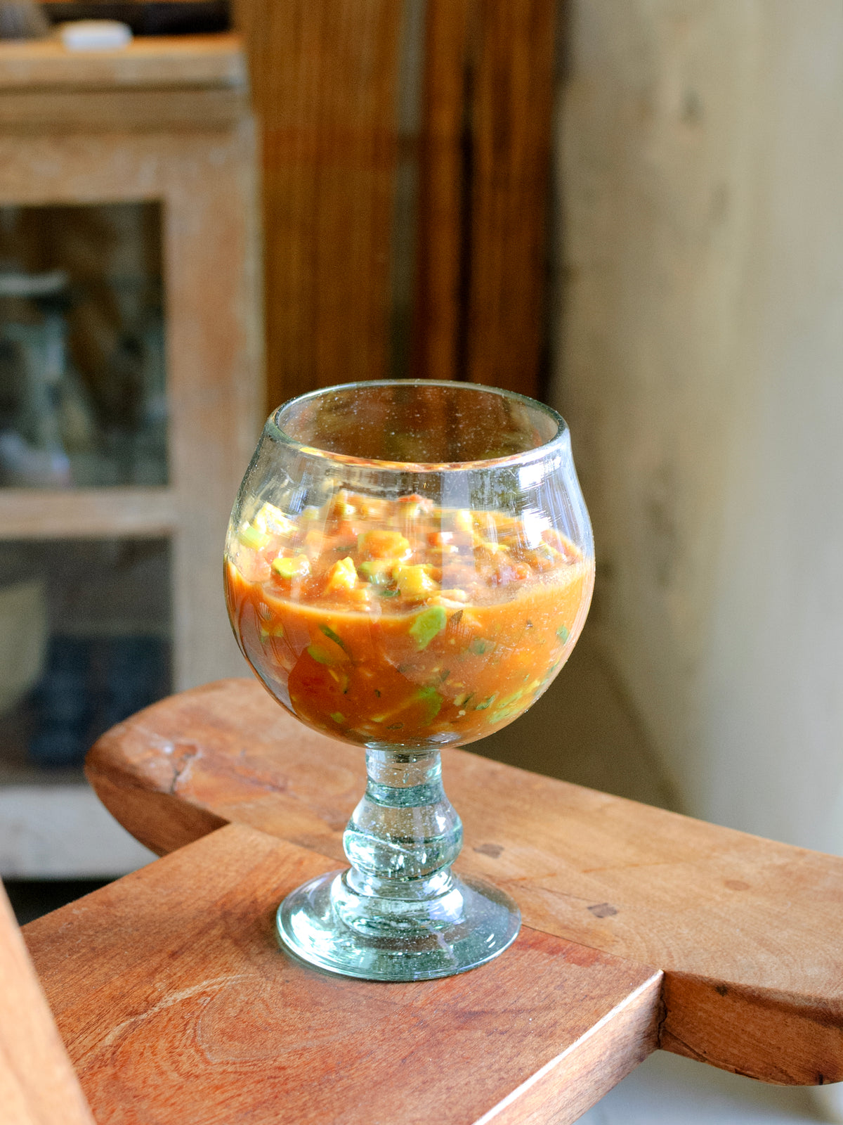 Oax-i-fornia Tongolele Water Cup made of colorful, traditional tableware ceramic with intricate patterns and a unique shape.