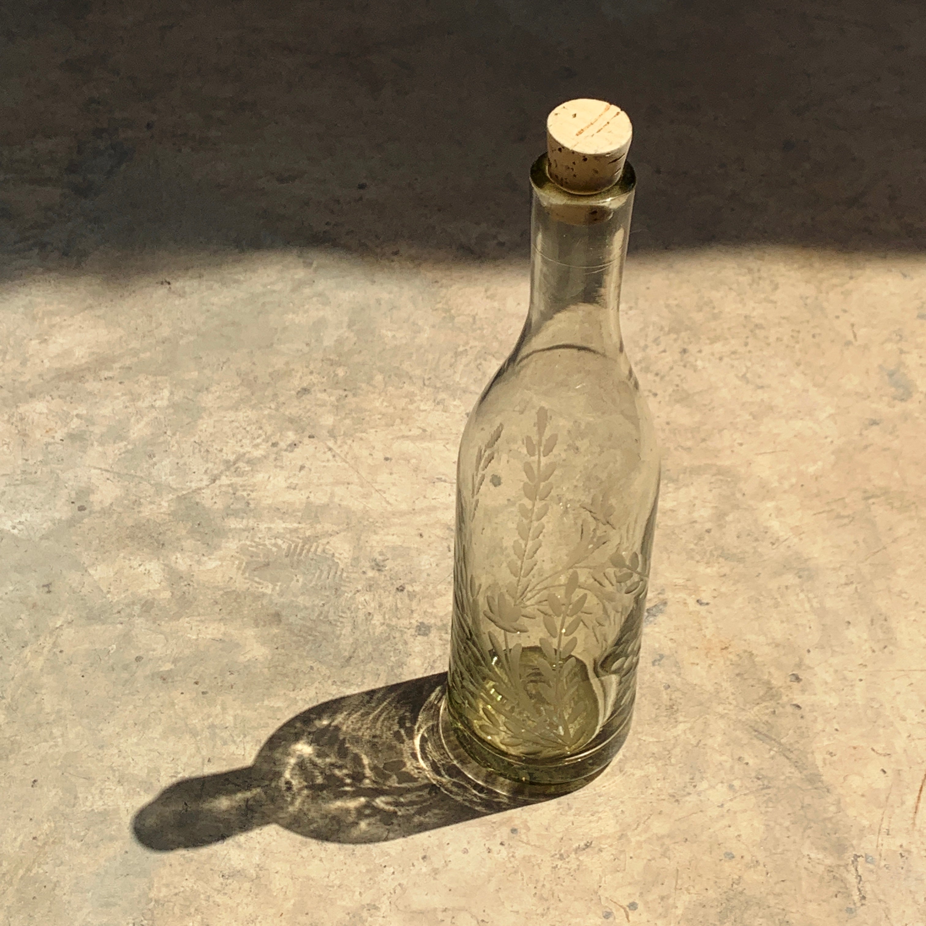 Hand Blown Glass Bottle with Pepita engraving