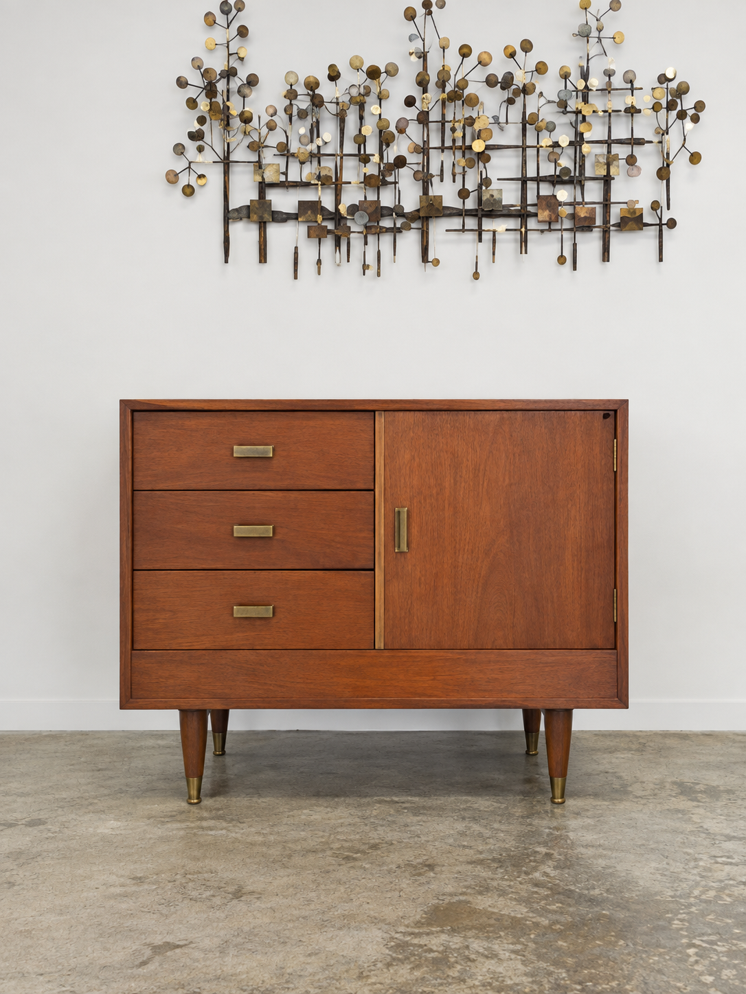 Mid-century wooden sideboard with teak finish and metal sculpture, vintage Mexican furniture from the 1950s–60s by Embajada Vintage.