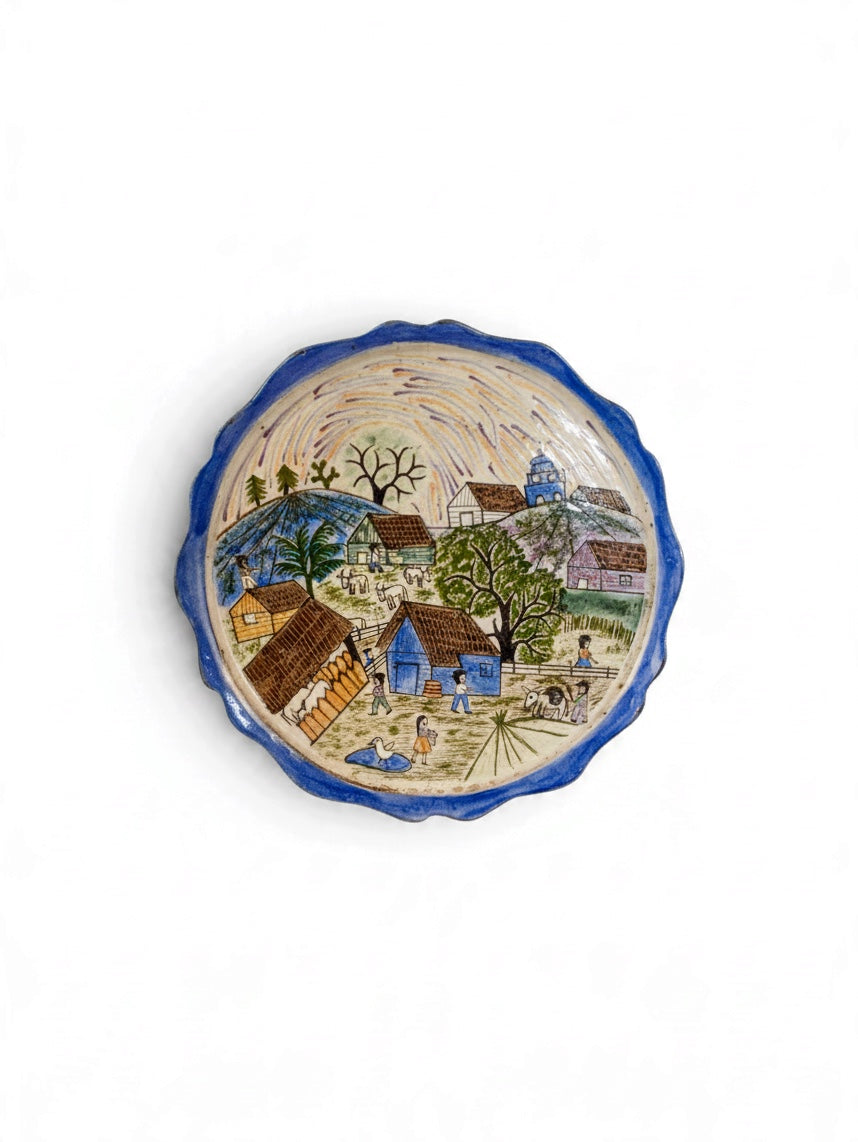 Colorful Patamban village scene ceramic plate by Embajada Vintage, showcasing traditional Mexican home decor art.