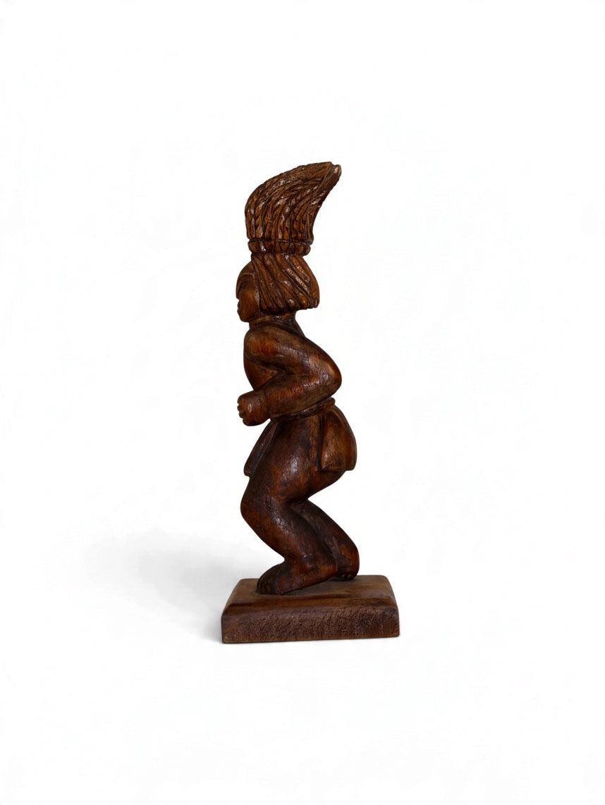 Sonoran wooden dancer sculpture by Embajada Vintage, a stylish home decor piece showcasing handcrafted wooden craftsmanship.