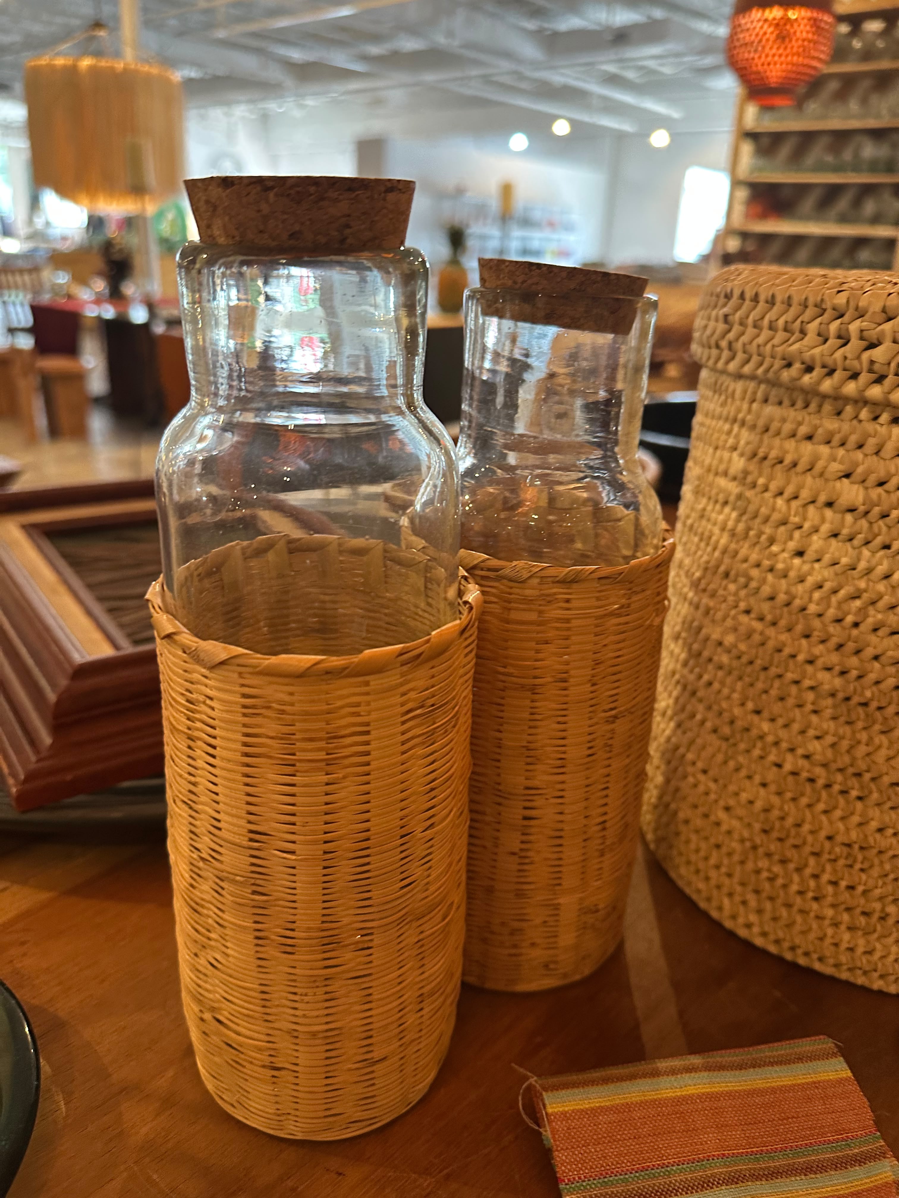 La Embajada Carrizo decanter with cork lid, clear glass vessel for storing and serving spirits or wine.