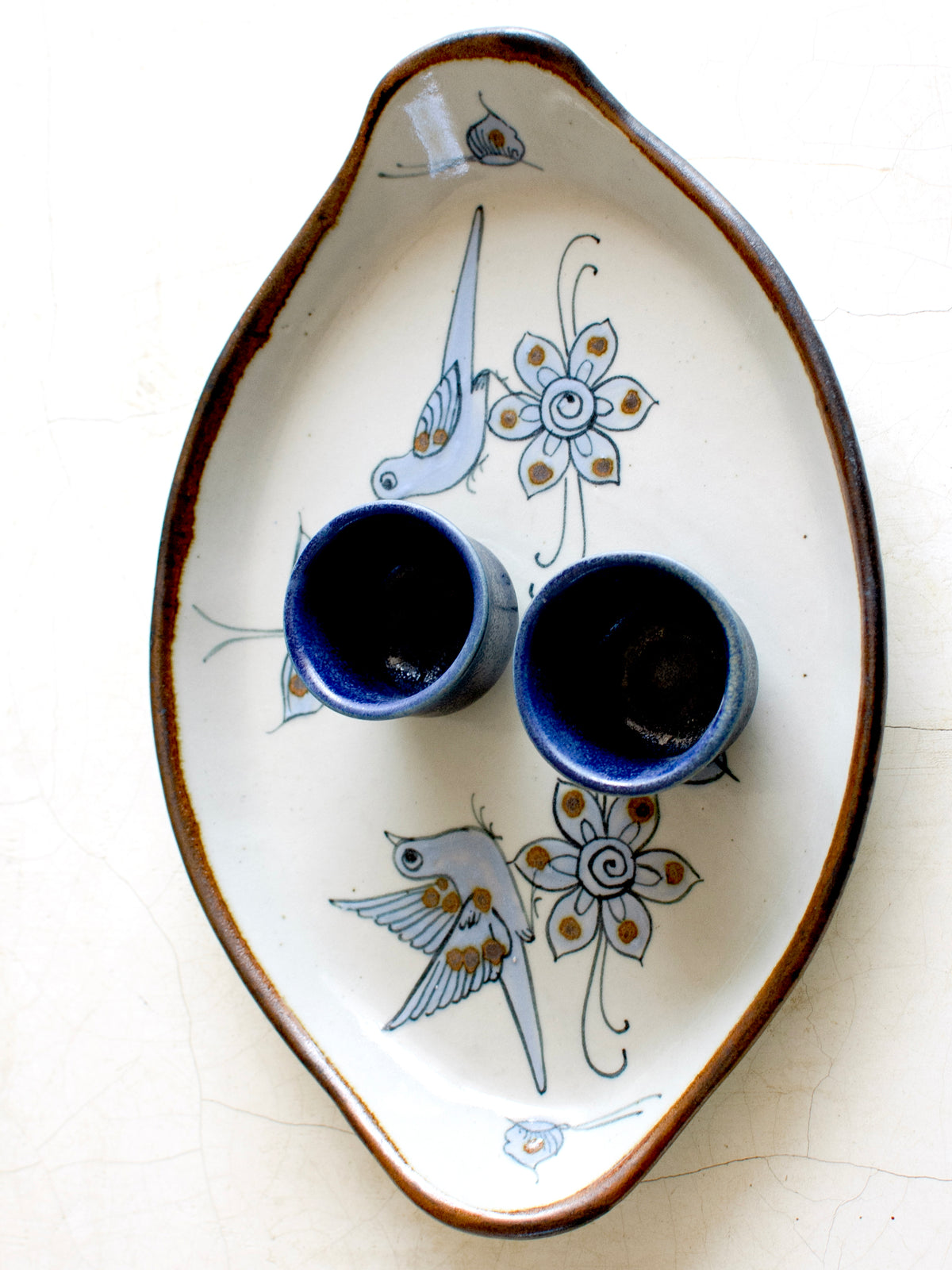 Embajada Craft El Palomar oval bird tray, decorative tabletop tableware with detailed bird design and elegant finish.