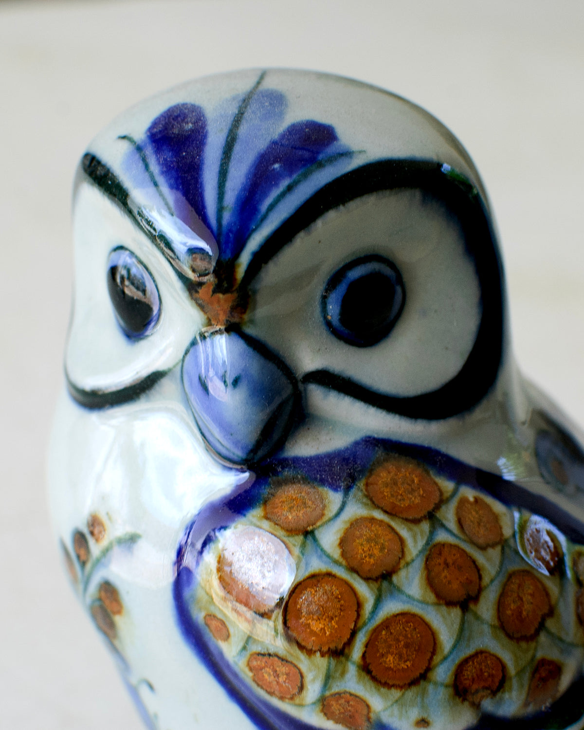 Decorative perched owl figurine by Embajada Craft, suitable for home decor, featuring detailed craftsmanship and rustic style.