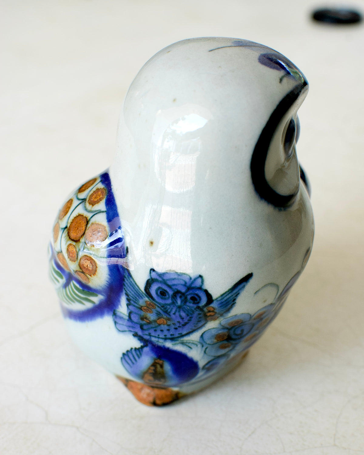 Decorative perched owl from El Palomar by Embajada Craft, crafted for home decor, showcasing detailed owl sculpture.