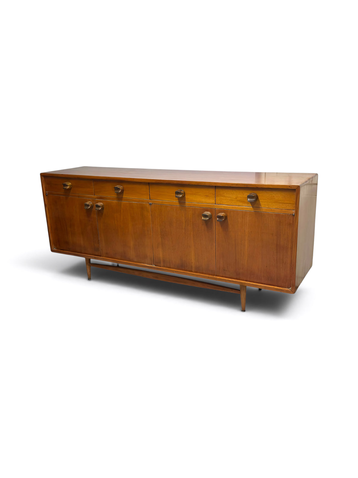 Mid-century wooden Mexican credenza by Embajada Vintage featuring sleek design, long storage drawers, and natural wood finish.